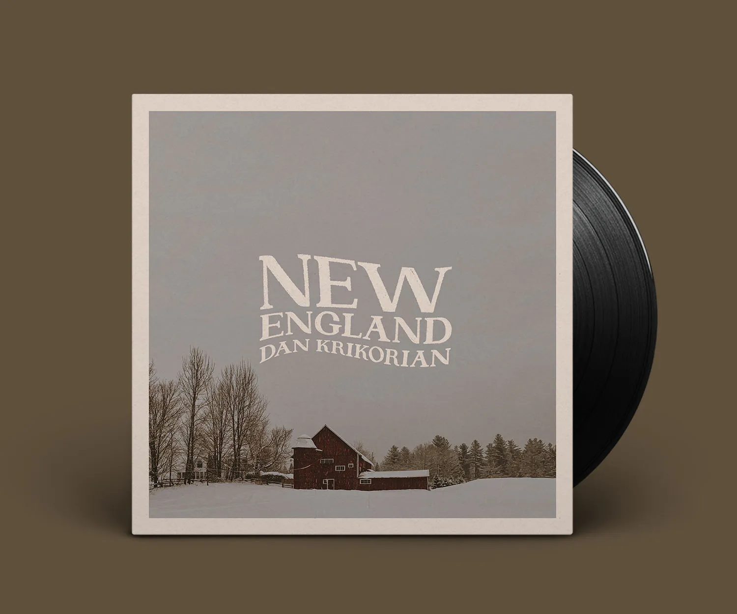 "New England" album cover with a snowy barn photograph.
