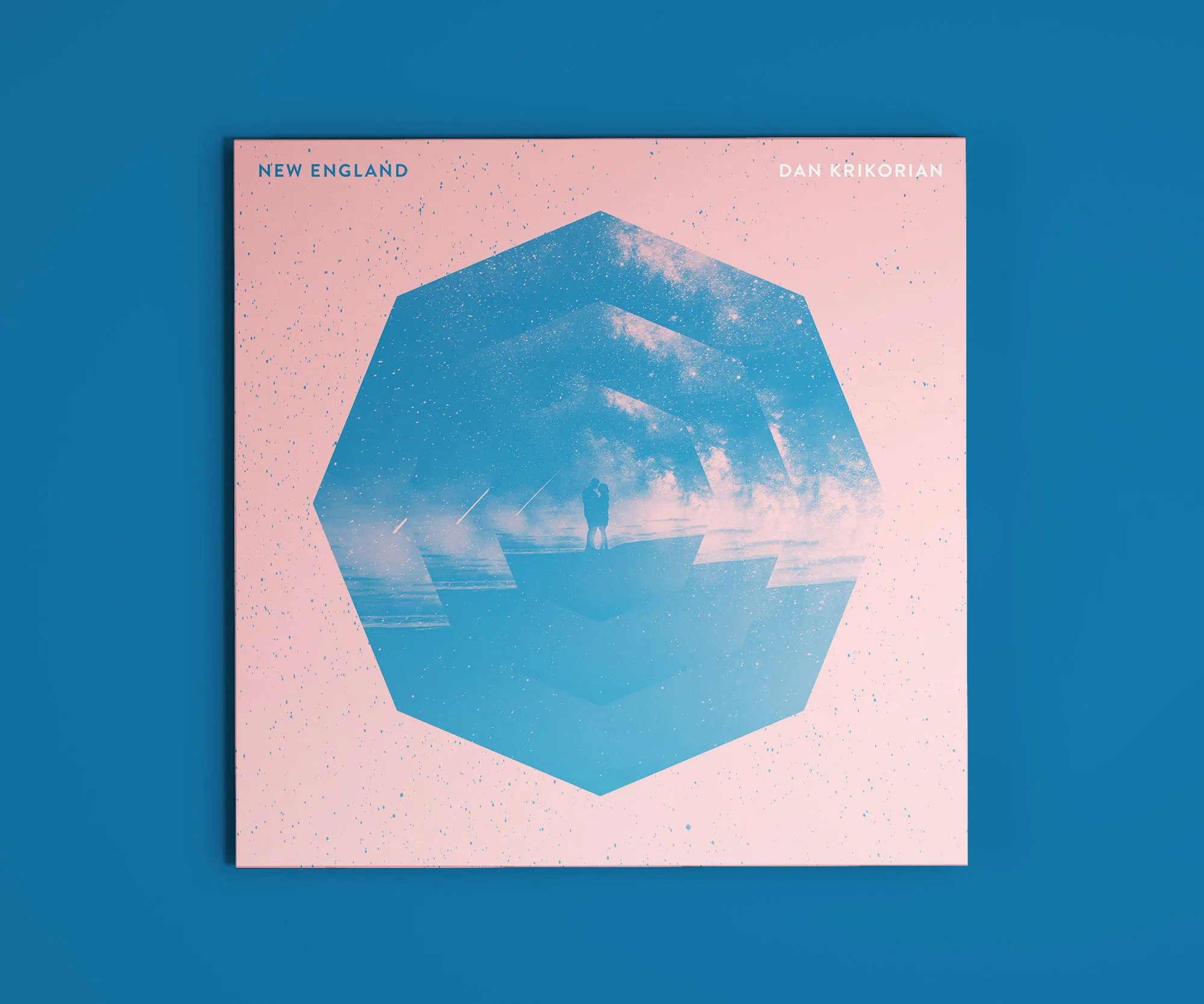 Alternate "New England" cover with a blue geometric landscape.