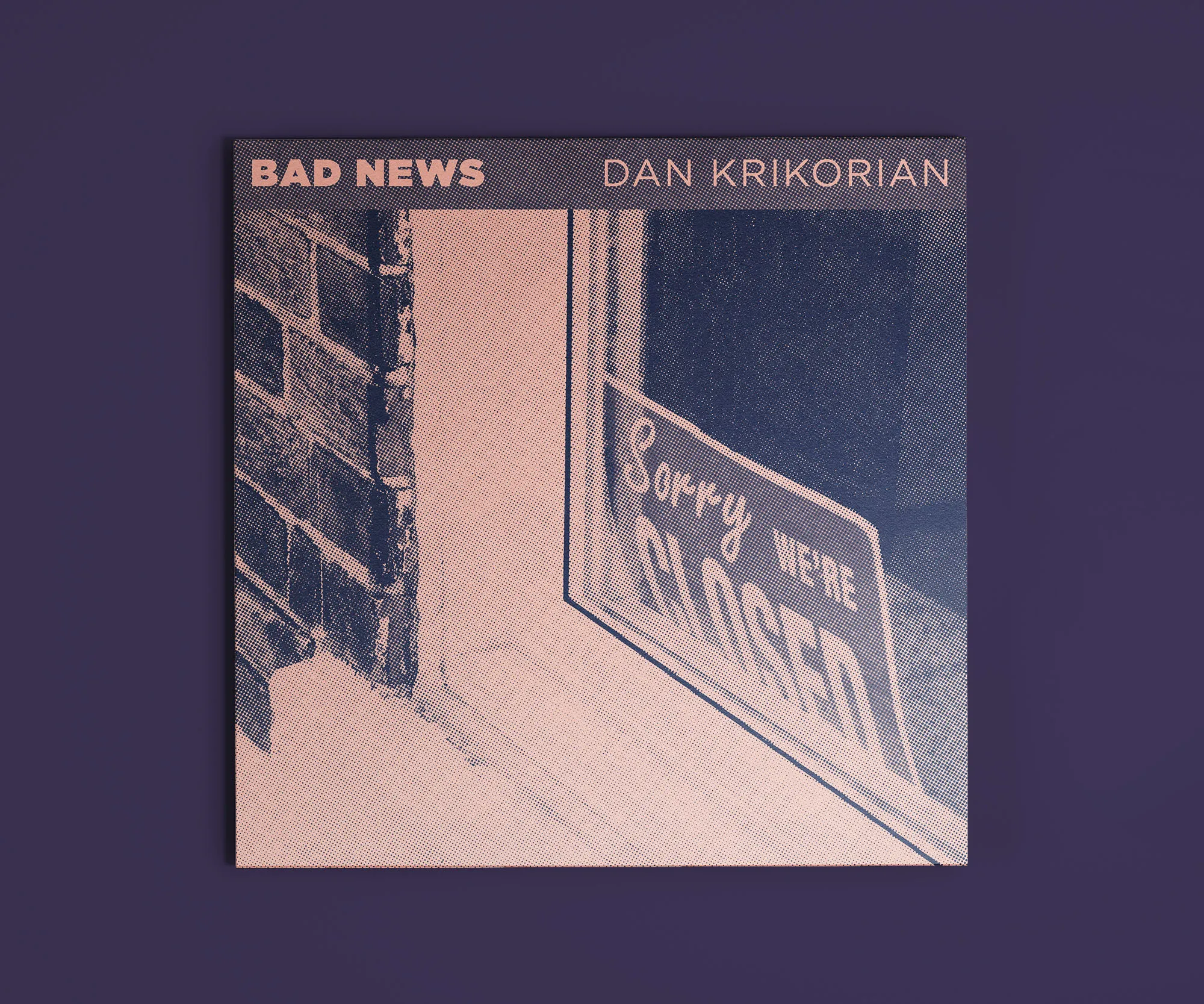 "Bad News" cover showing a faded "Sorry, we’re closed" sign.